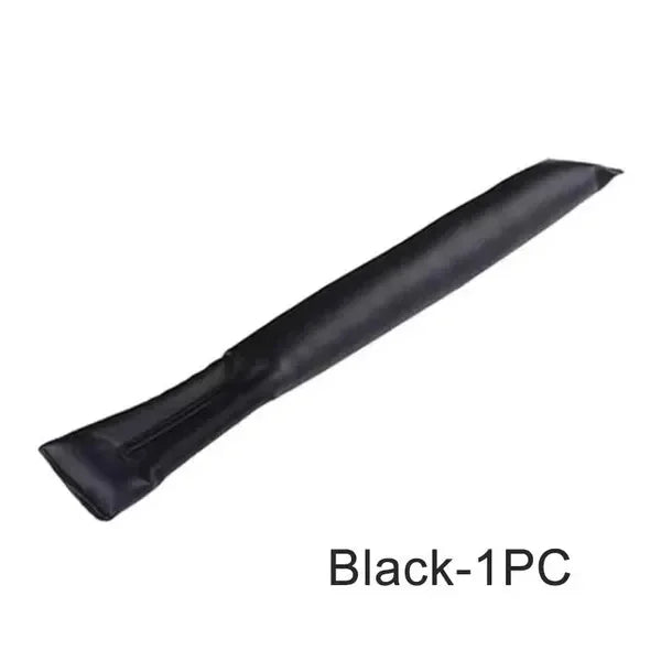 Travel "seat gap" bolster keeps your phone, keys, glasses, wallet from falling between car seats.