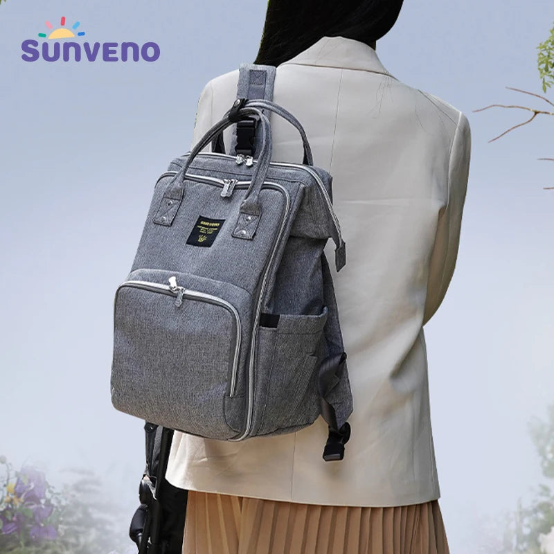 Stylish Diaper Bag/Backpack with Insulated Pocket, Stores 3 Bottles, Changing Pad for families on the GO